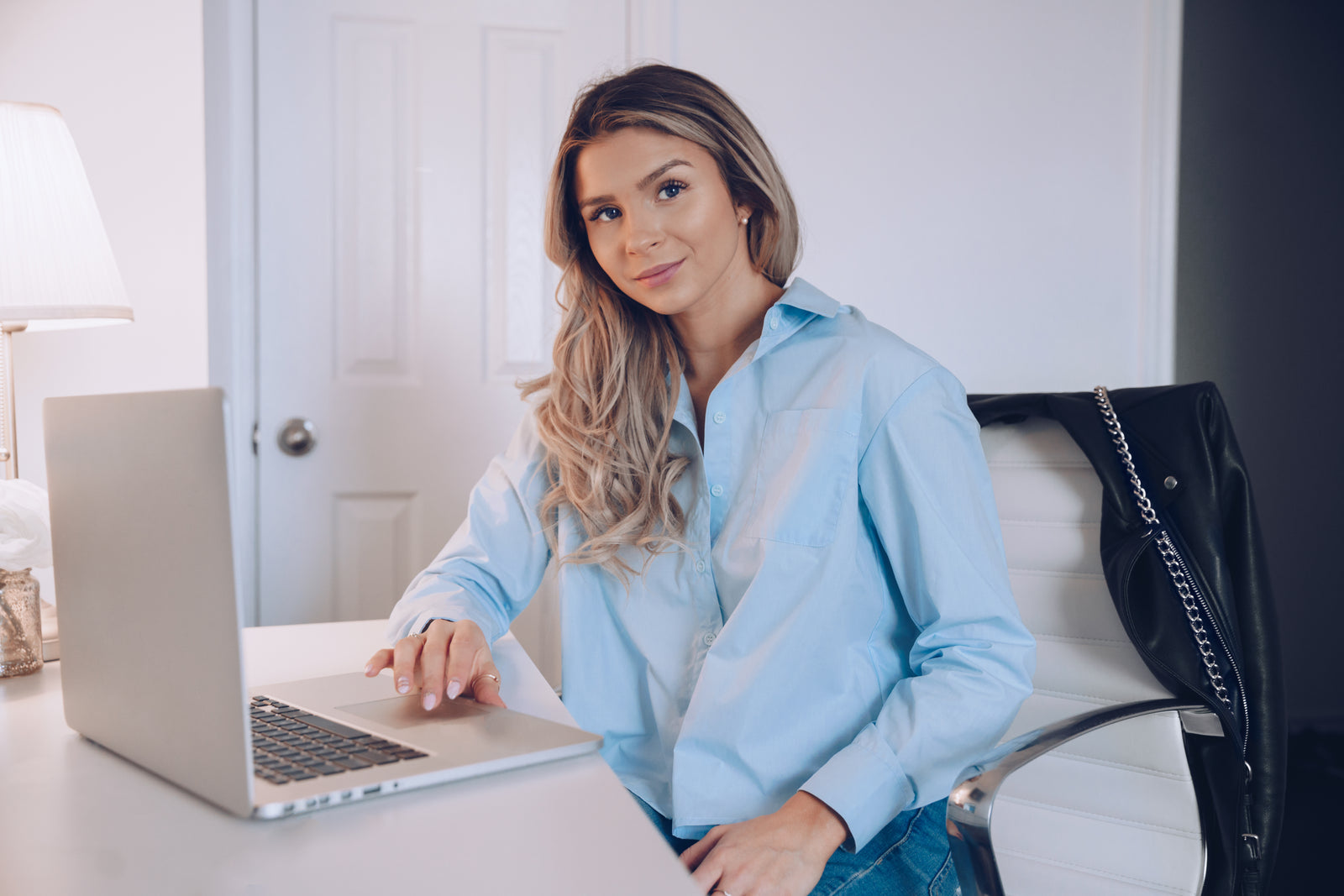 A buyer working on a laptop